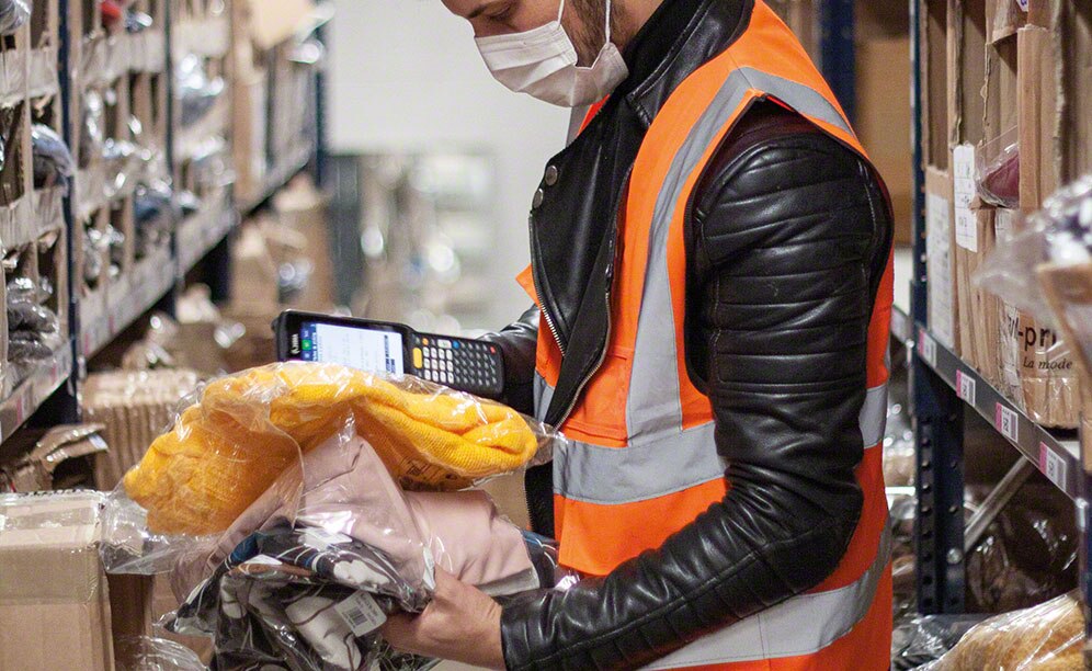Operators prepare orders with RF scanners